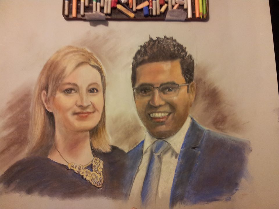 pastel portrait of indian man and wife designed by a portrait artists in Brisbane
