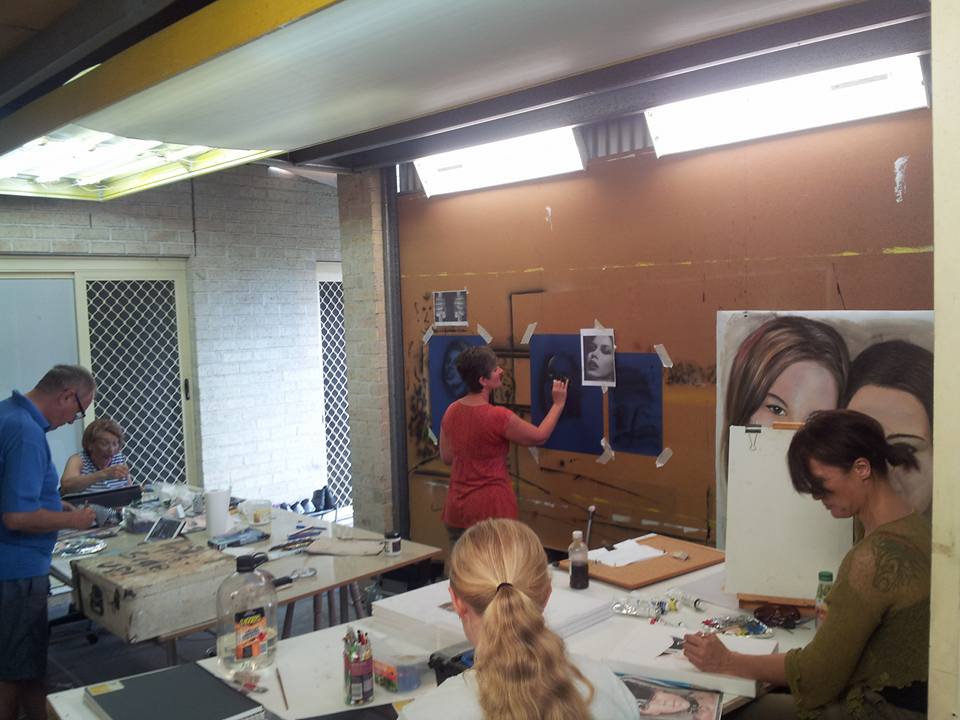 Art class with 1 student. Smiling faces of a couple. portrait artists learning in Brisbane