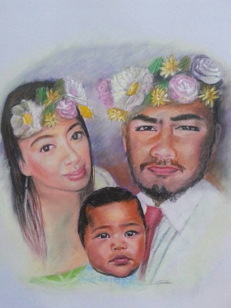 Step 4 artist creating pastel portrait of family of 3